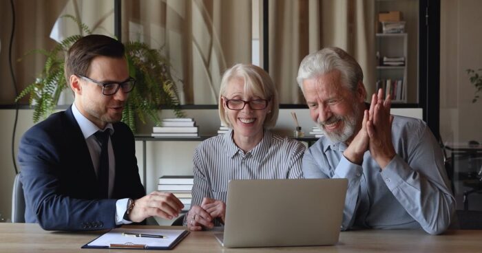 A B.O.S.S. advisor reviewing a personalized retirement plan with a retired couple